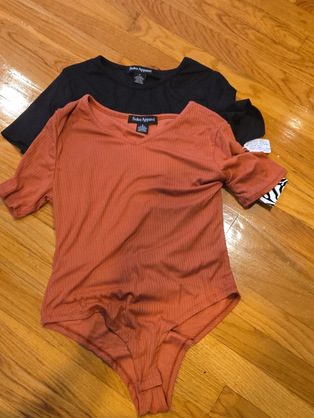 Soho Apparel Ribbed Bodysuit in Rust and Black